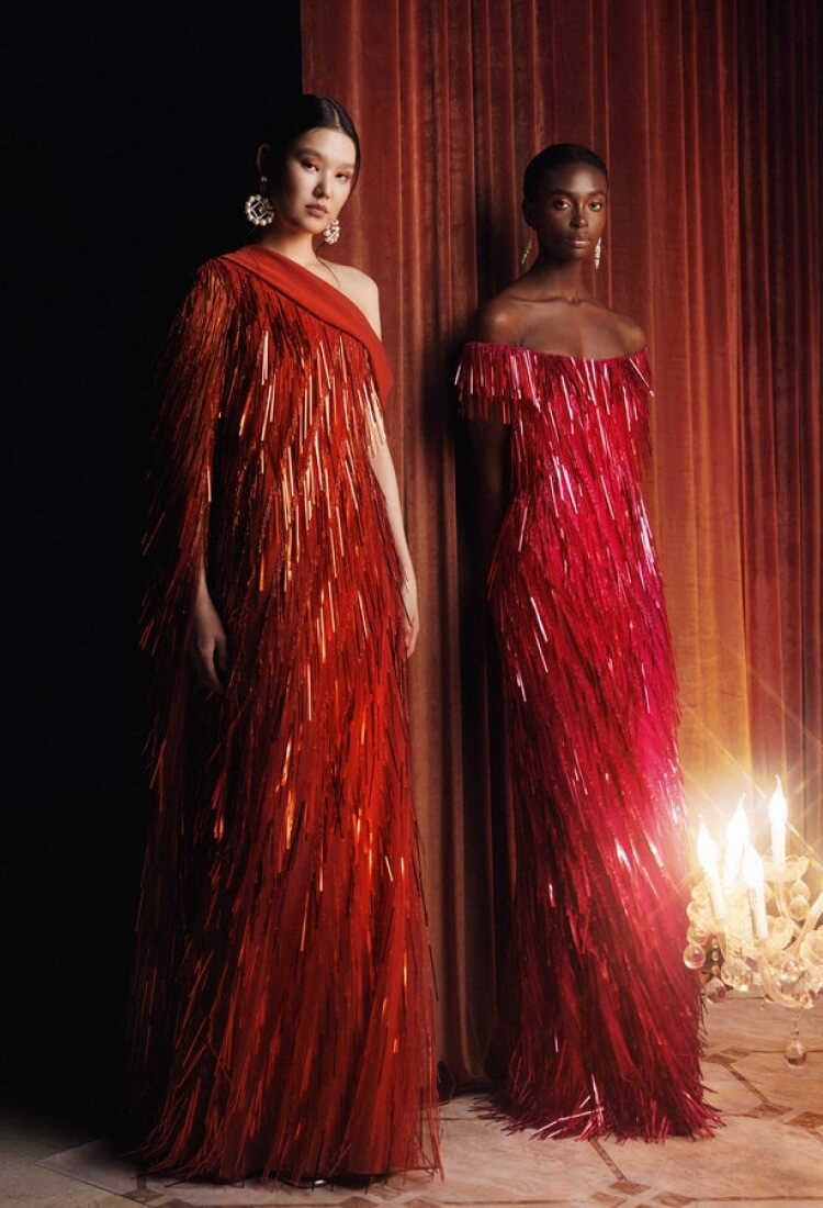Models wearing a red dresses
